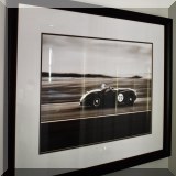 A24. Framed race car photo. 36”h x 28.5”w - $125